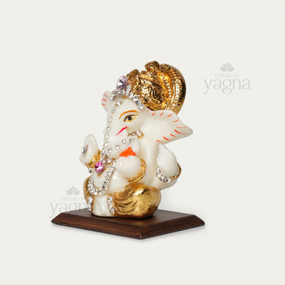 Car Ganesha Idol – Symbol of Auspicious Beginnings